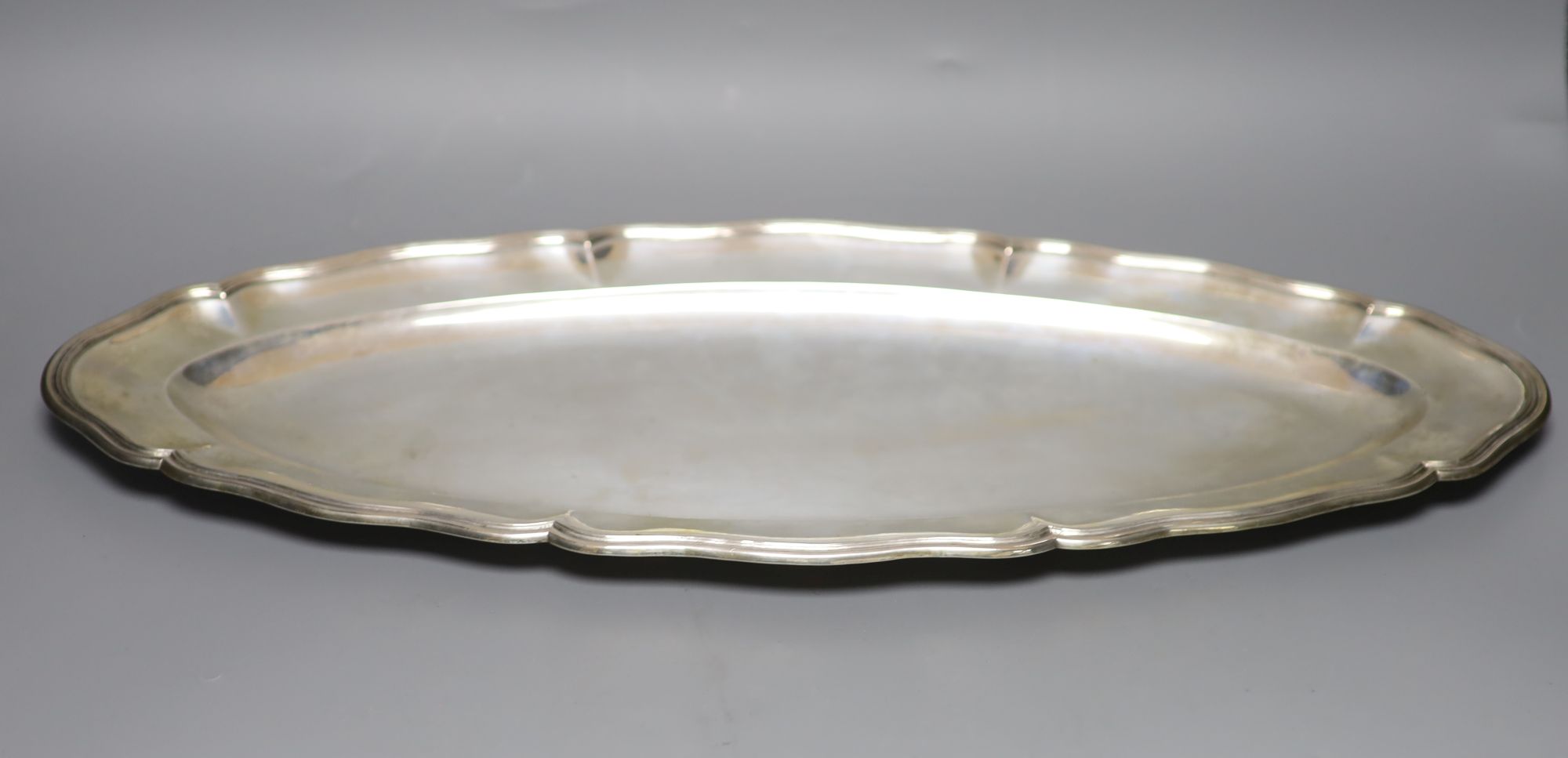 An Italian 800 standard white metal oval serving platter by Missiaglia, approx 37oz; L 58cm W 25.5cm